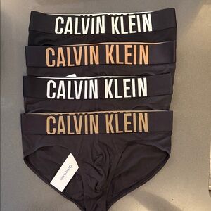 New Cotton Calvin Klein Black Hip Briefs 4 Pack.  Intense Power